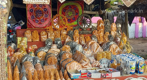 Vendor selling varieties of stone and applique work items