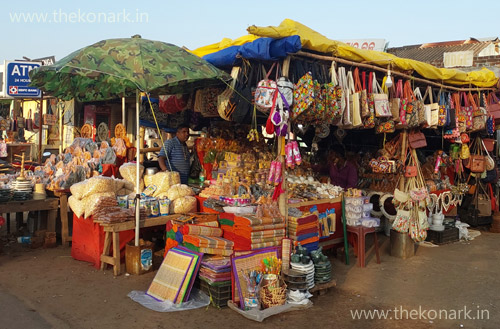 Vendor selling varieties of handicraft items